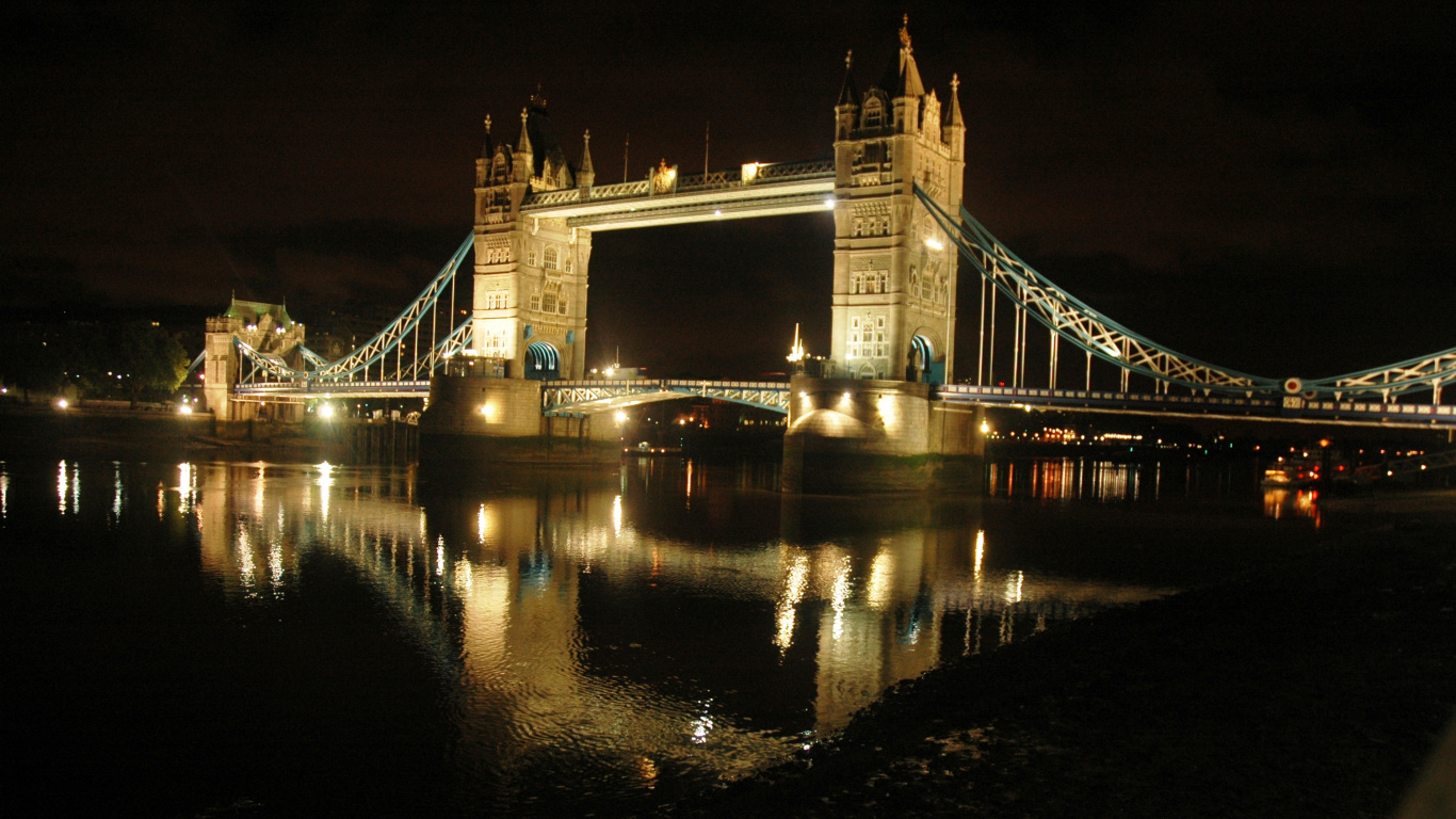 White Bridge Over River During Night Time. Wallpaper in 1366x768 Resolution