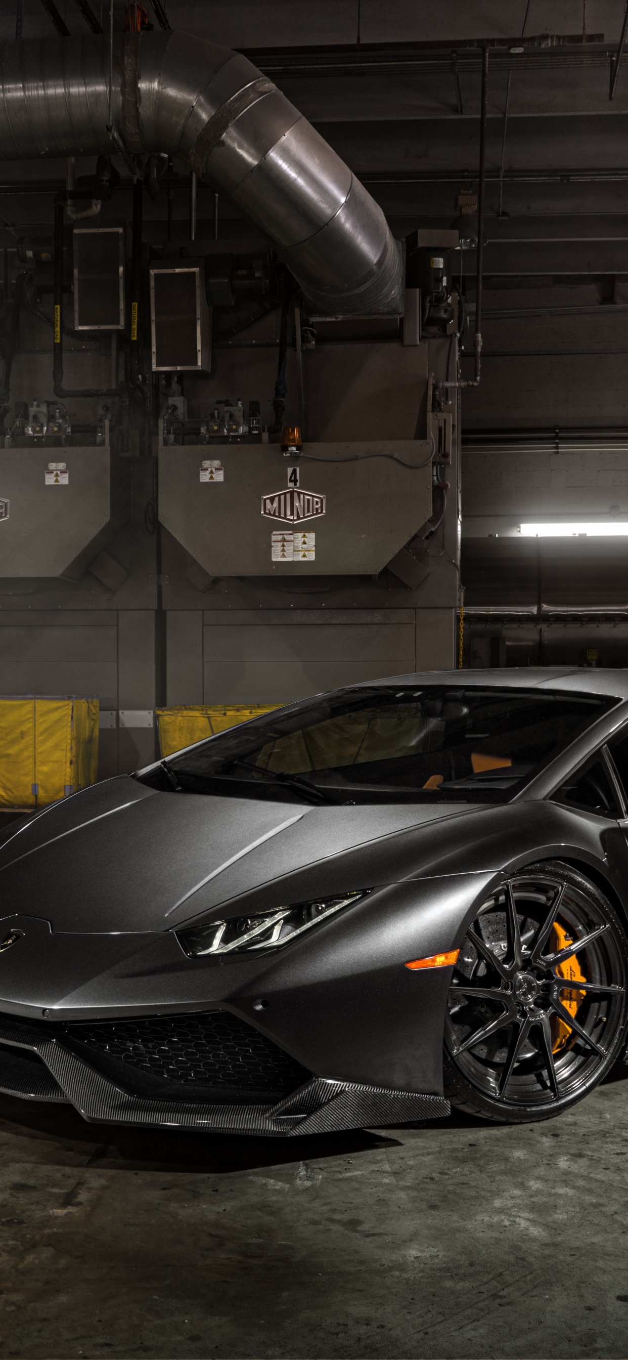 Black Porsche 911 Parked in Garage. Wallpaper in 1242x2688 Resolution