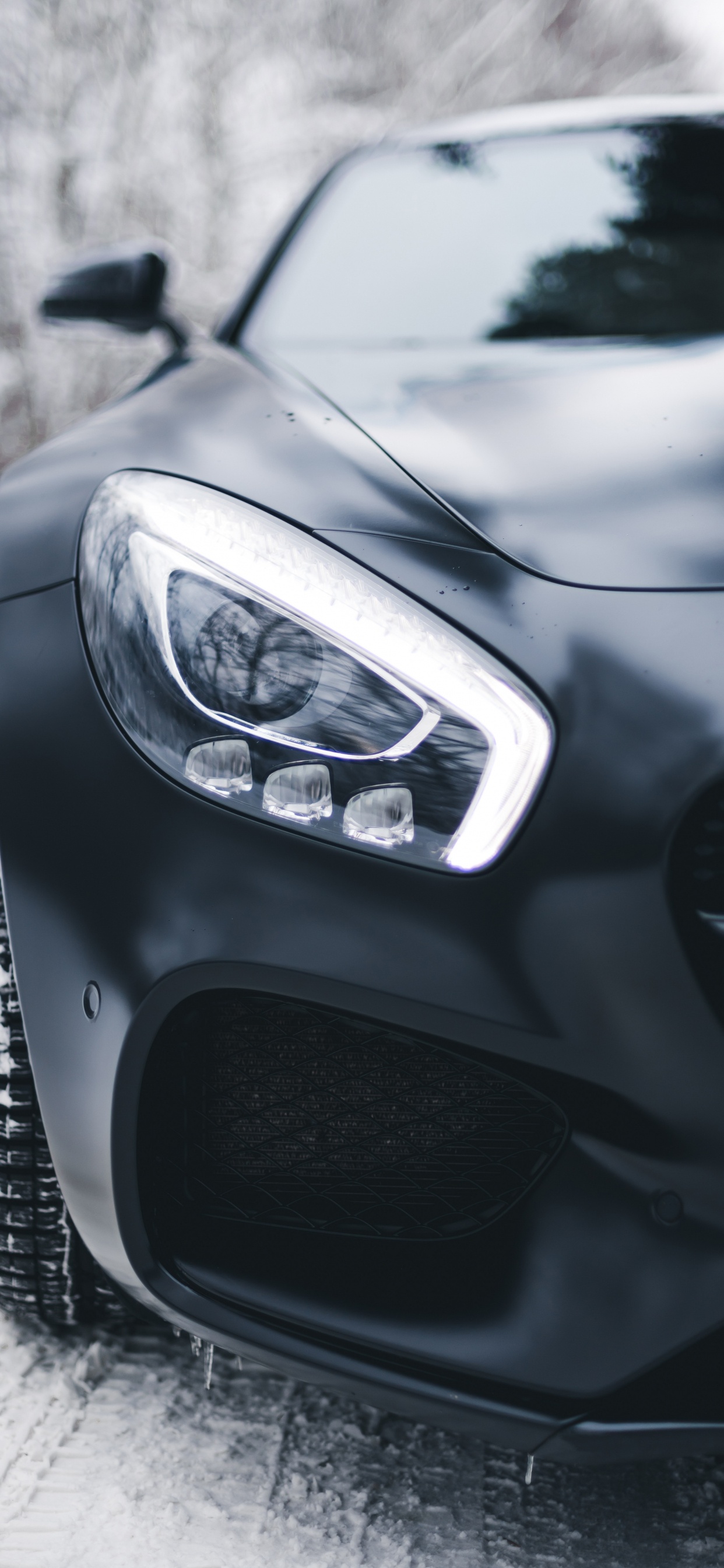 Grayscale Photo of Car Headlight. Wallpaper in 1242x2688 Resolution