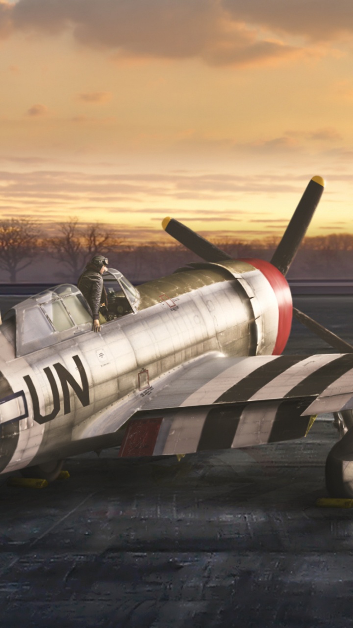 Weißes Und Rotes Flugzeug am Flughafen Während Des Sonnenuntergangs. Wallpaper in 720x1280 Resolution