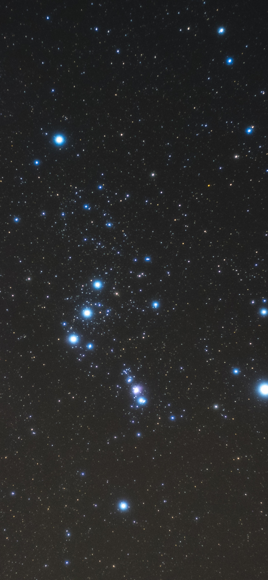 Étoiles Blanches et Bleues Dans le Ciel. Wallpaper in 1125x2436 Resolution