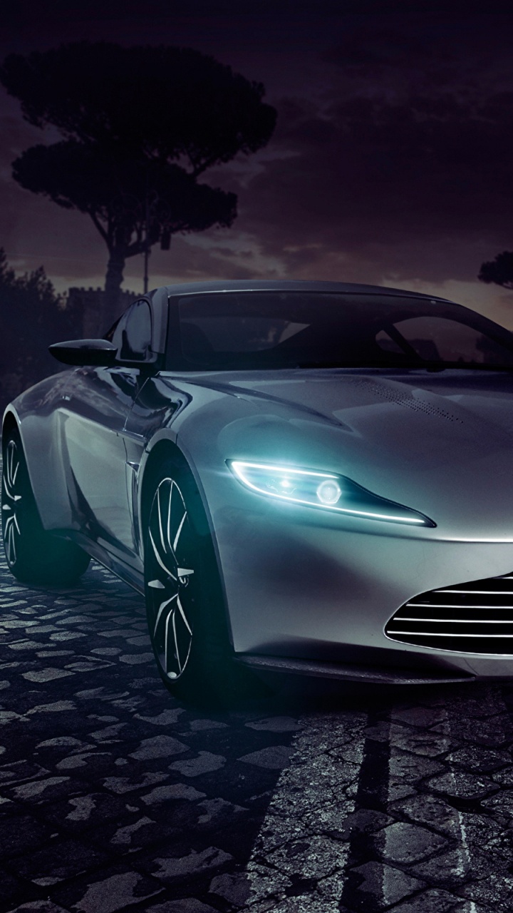 Porsche 911 Argent Sur Trottoir Gris. Wallpaper in 720x1280 Resolution