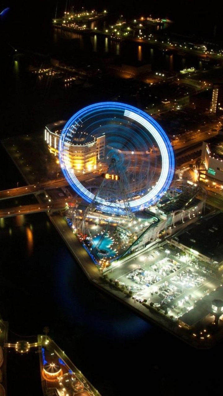 Vue Aérienne Des Bâtiments de la Ville Pendant la Nuit. Wallpaper in 720x1280 Resolution
