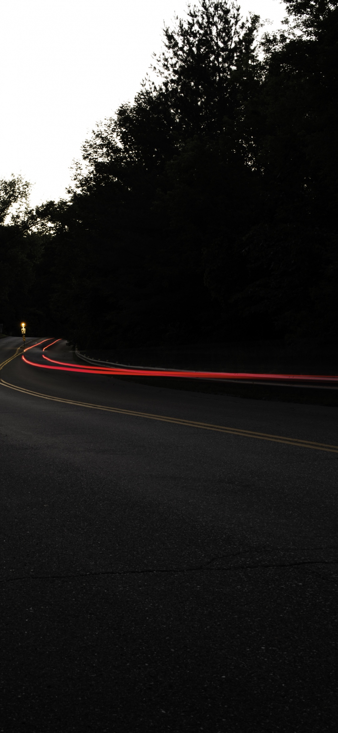 Time Lapse Photography of Road During Night Time. Wallpaper in 1125x2436 Resolution