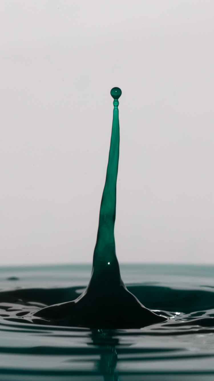 Person in Water During Daytime. Wallpaper in 750x1334 Resolution