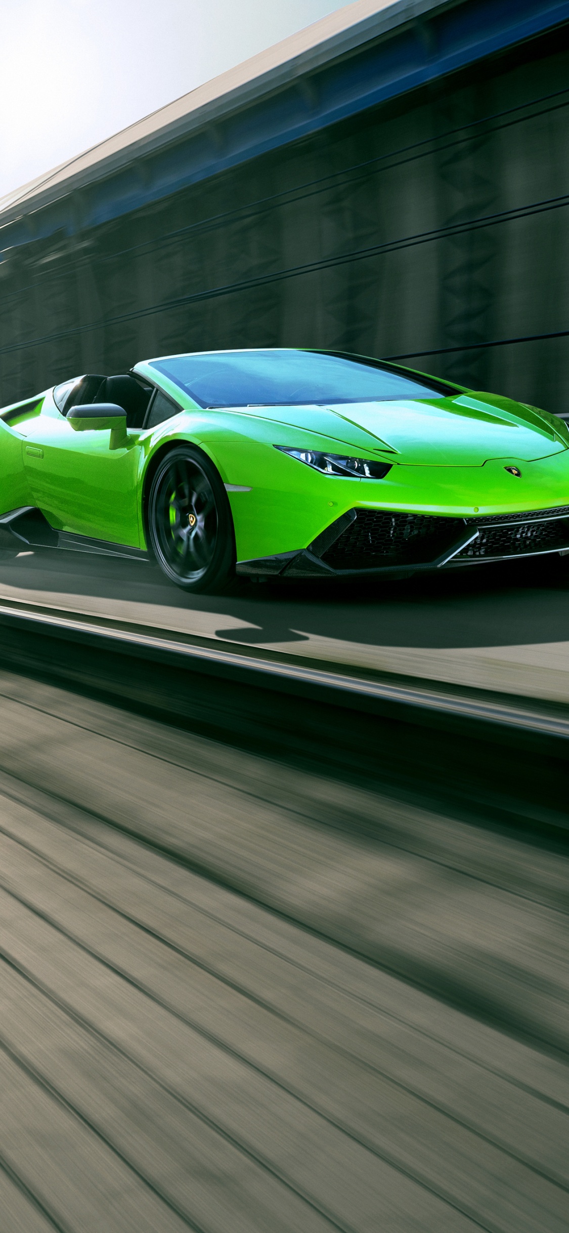 Green Porsche 911 on Road During Daytime. Wallpaper in 1125x2436 Resolution