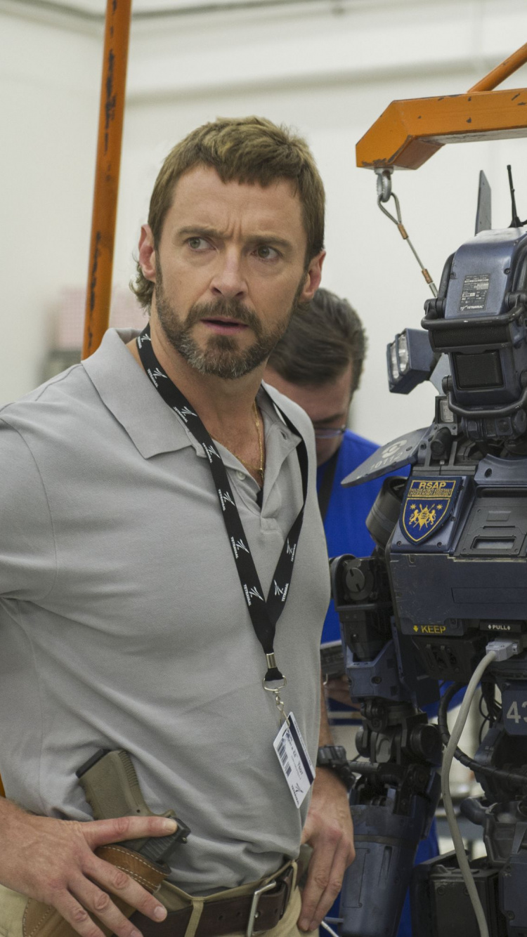 Homme en Polo Gris Debout à Côté D'une Moto Noire. Wallpaper in 750x1334 Resolution