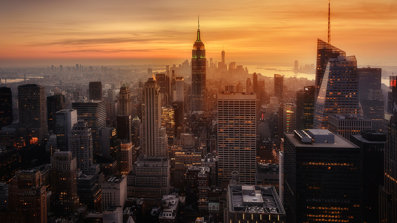Luftaufnahme Von Stadtgebäuden Bei Sonnenuntergang. Wallpaper in 1280x720 Resolution