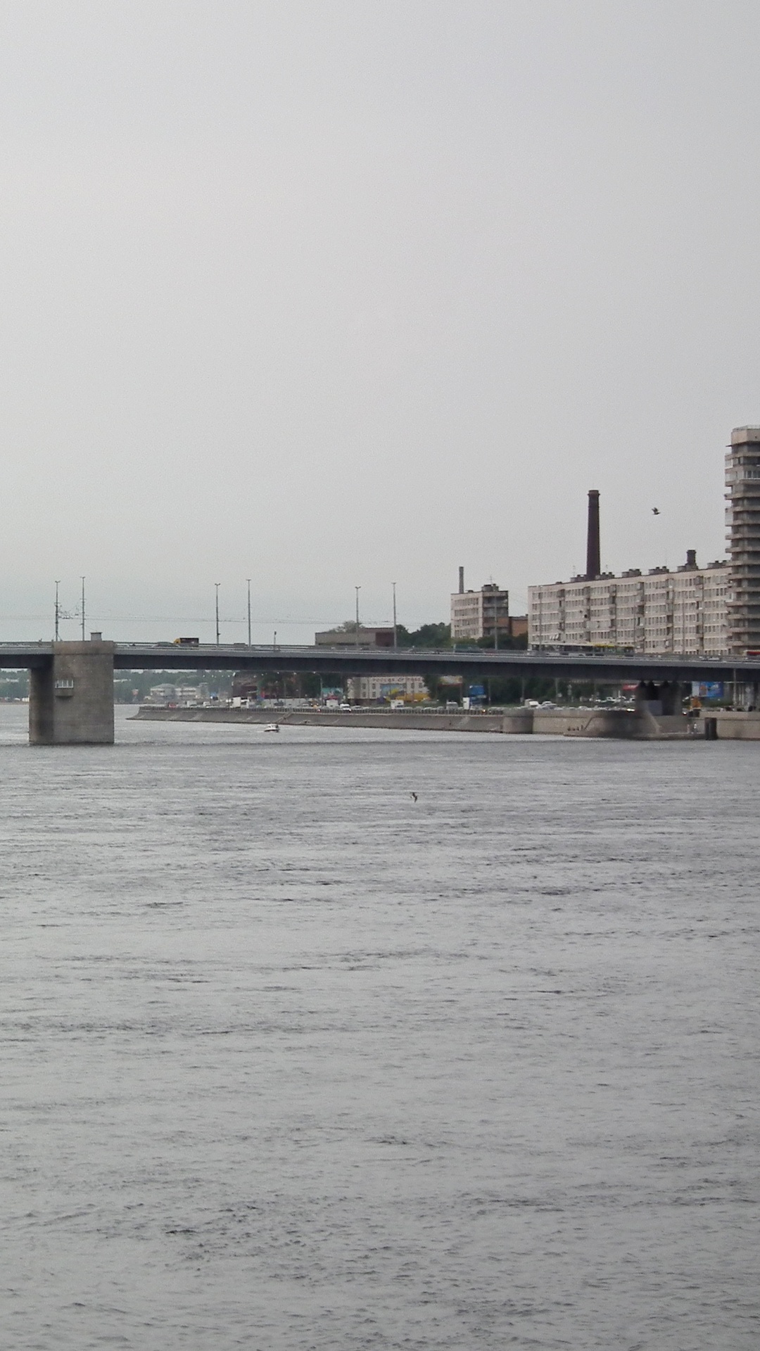 Brown Concrete Bridge Over Body of Water During Daytime. Wallpaper in 1080x1920 Resolution