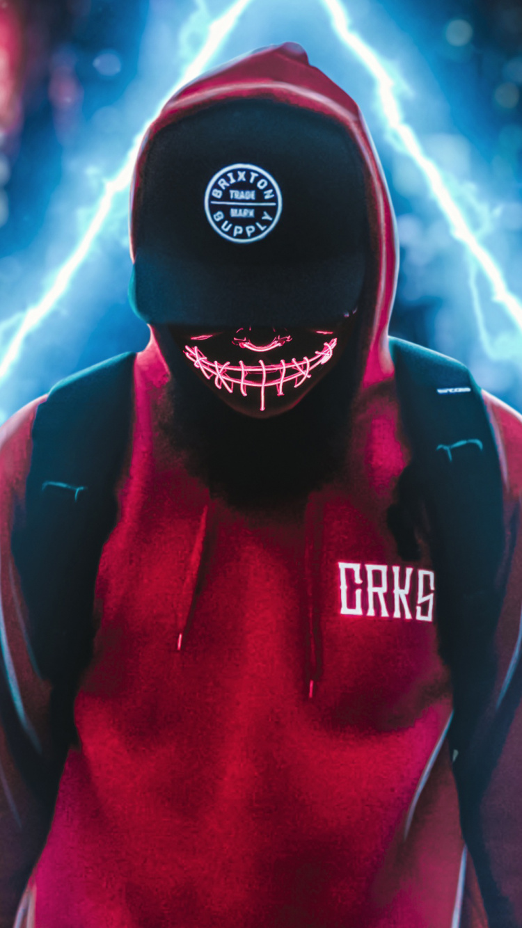 Man in Red and Black Jacket Wearing Black Knit Cap. Wallpaper in 750x1334 Resolution