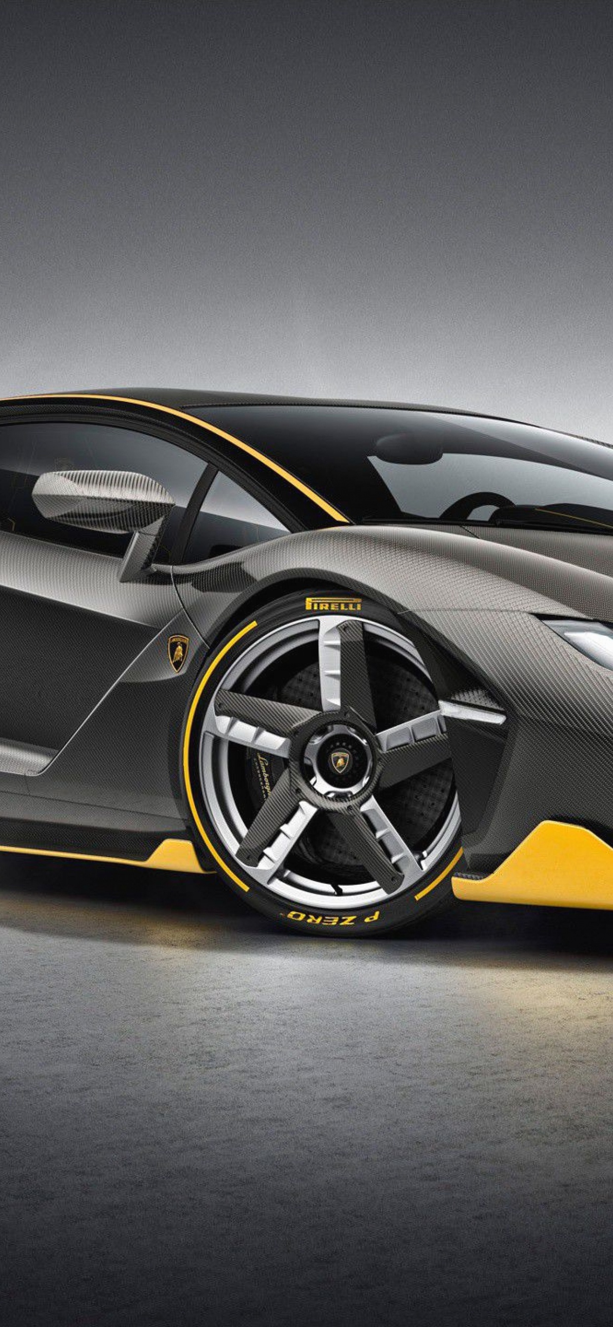 Black and Yellow Lamborghini Aventador. Wallpaper in 1242x2688 Resolution