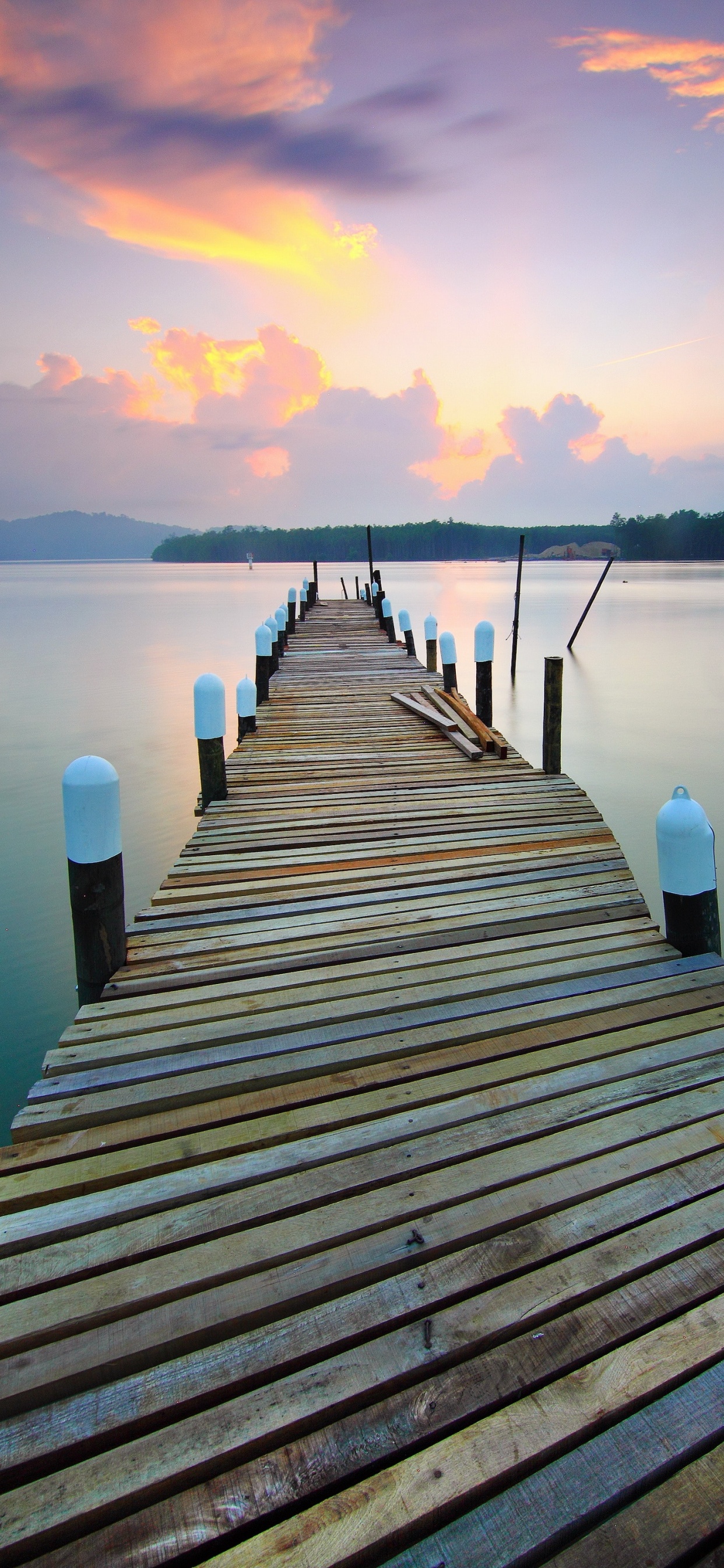 Brown Wooden Dock on Lake During Sunset. Wallpaper in 1242x2688 Resolution
