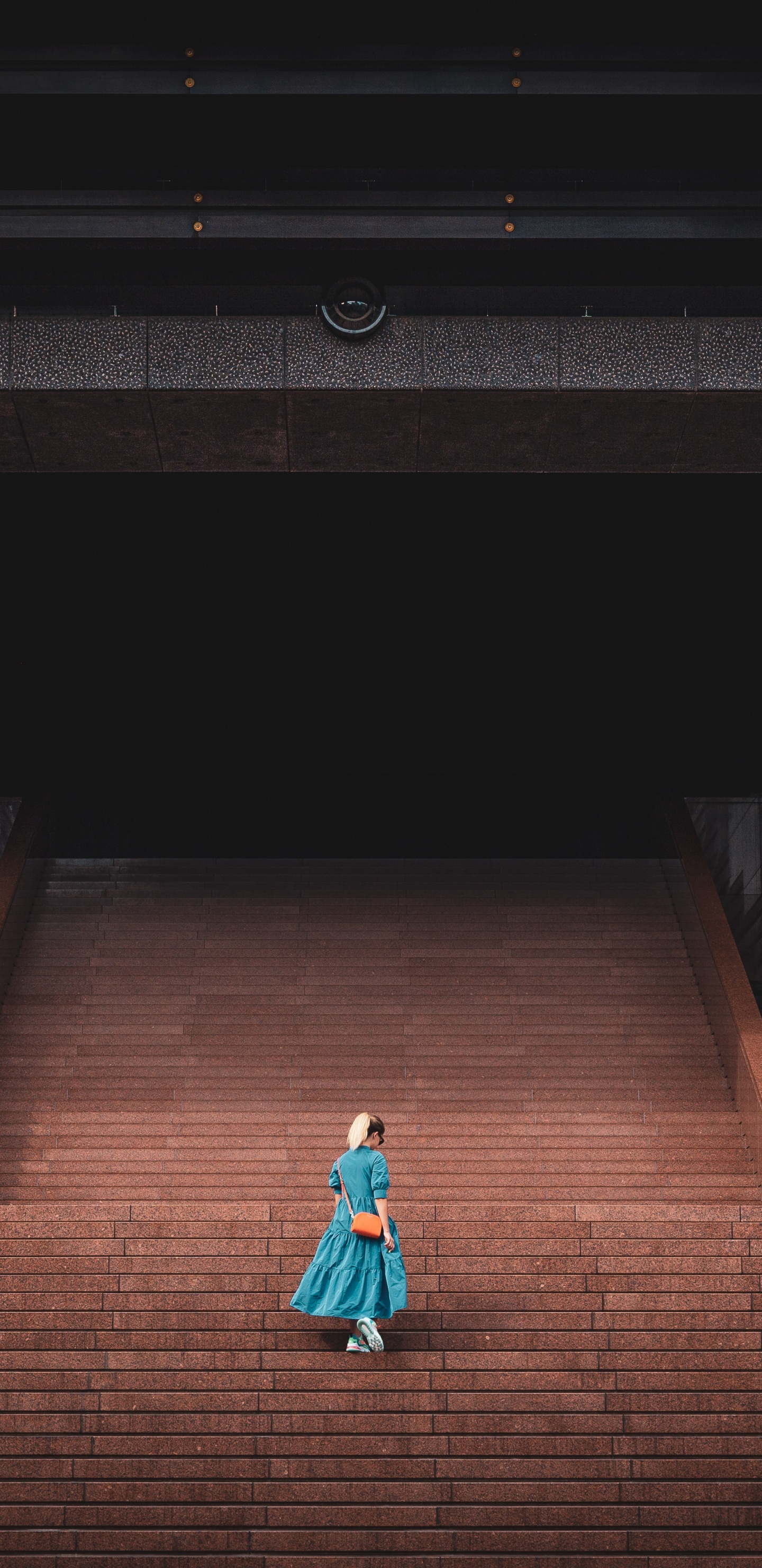 Woman in Teal Dress Walking on Stairs. Wallpaper in 1440x2960 Resolution