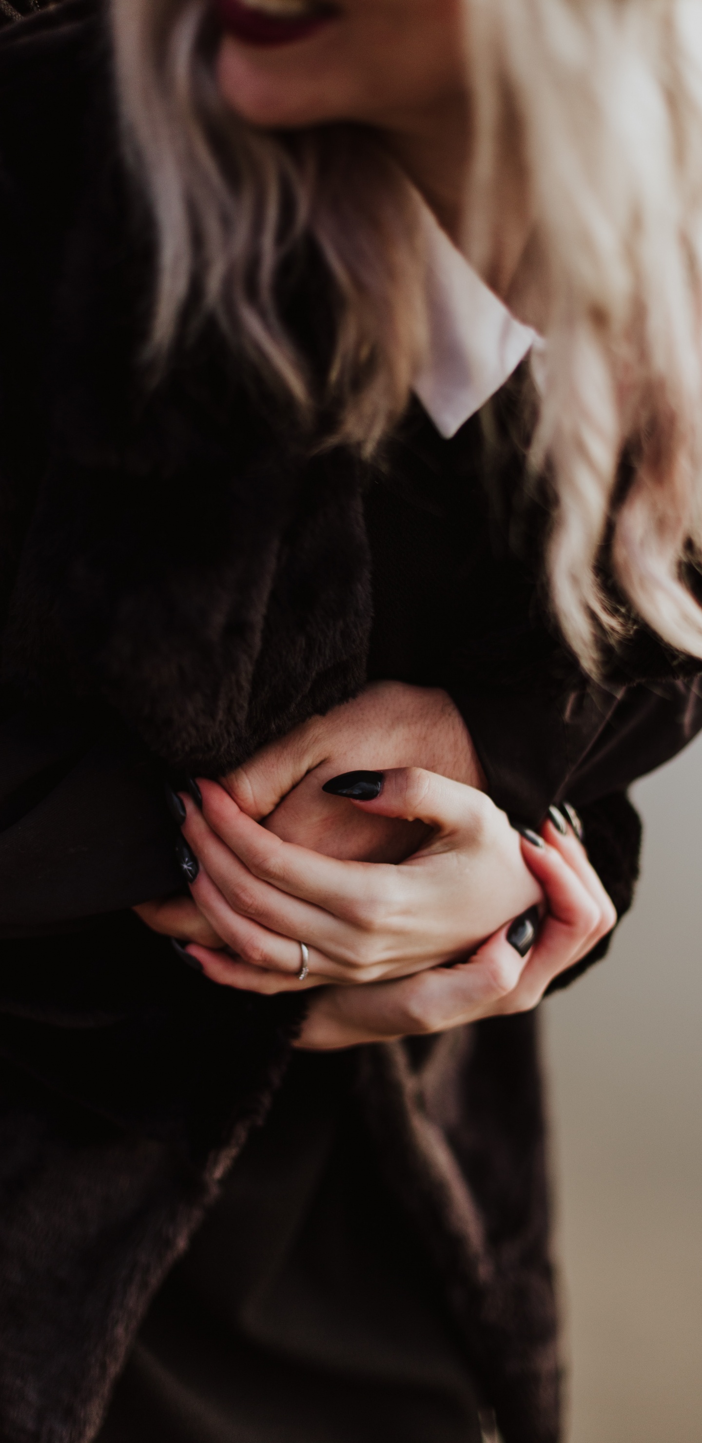 Woman in Black Long Sleeve Shirt Covering Her Face. Wallpaper in 1440x2960 Resolution