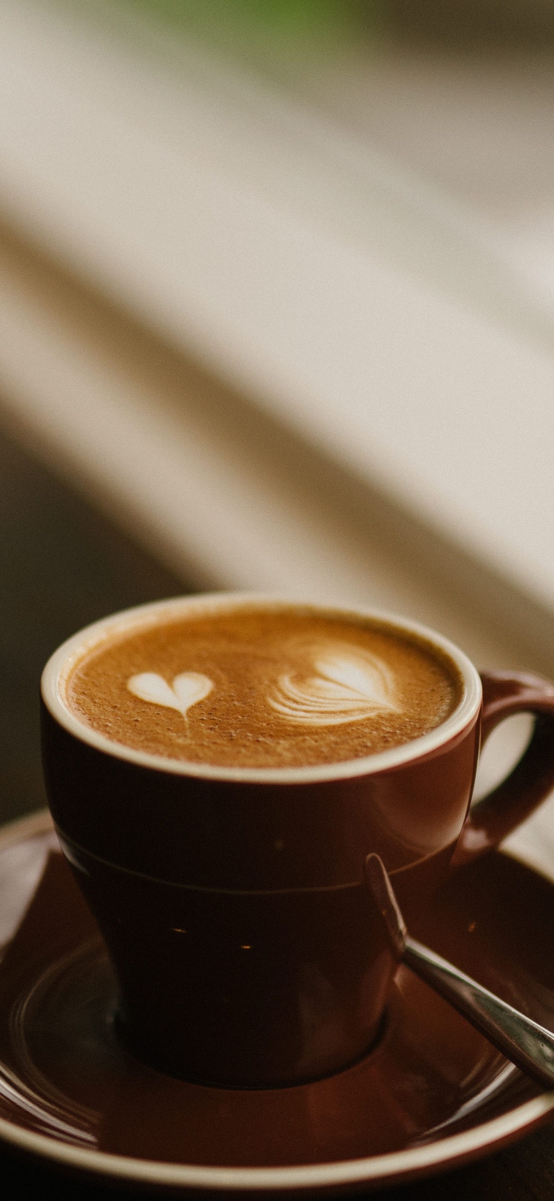 Brown Ceramic Mug on Saucer. Wallpaper in 1125x2436 Resolution