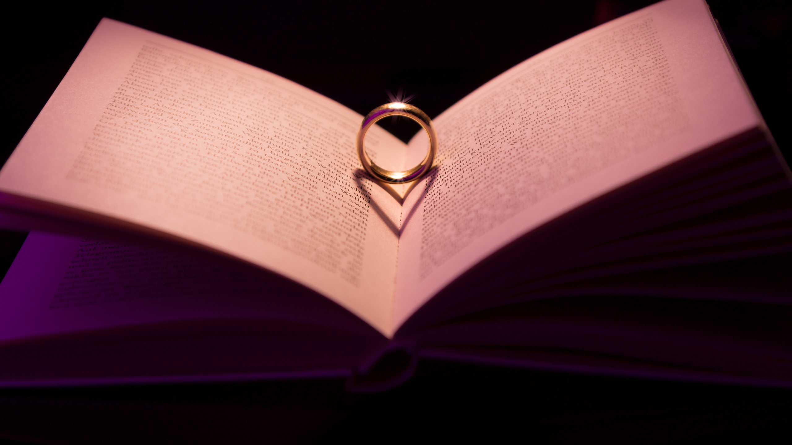 Silver Ring on White Book Page. Wallpaper in 2560x1440 Resolution