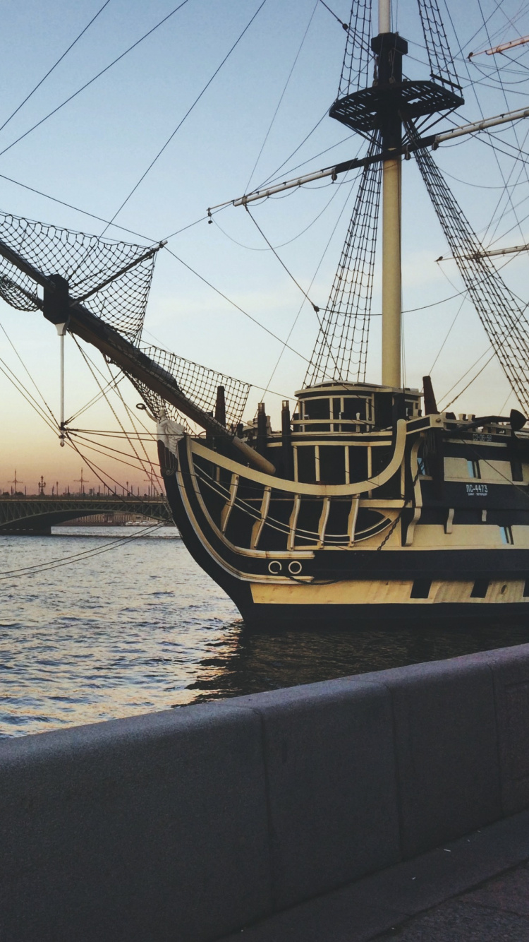 Silhouette of Ship on Sea During Sunset. Wallpaper in 750x1334 Resolution