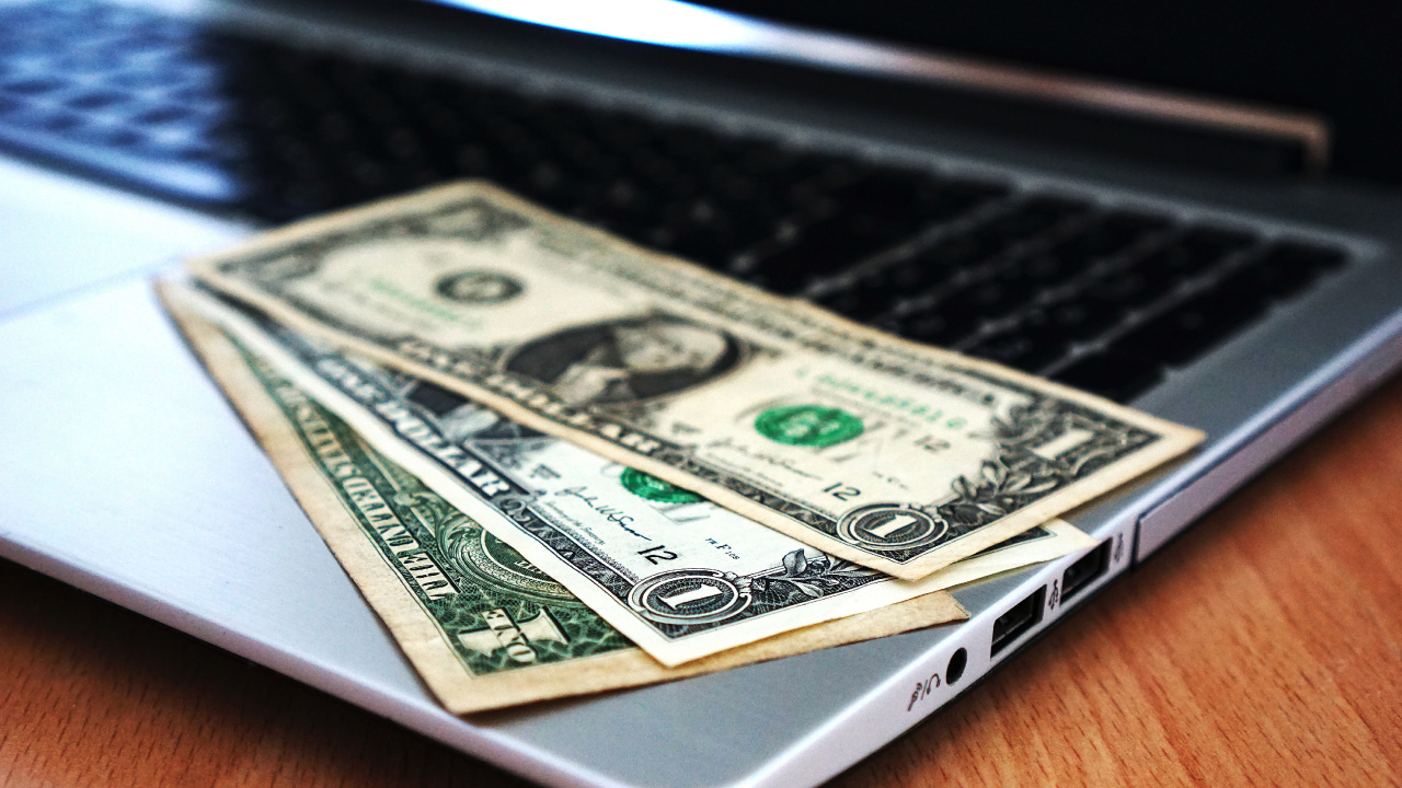 1 us Dollar Bill on Macbook Pro. Wallpaper in 1280x720 Resolution