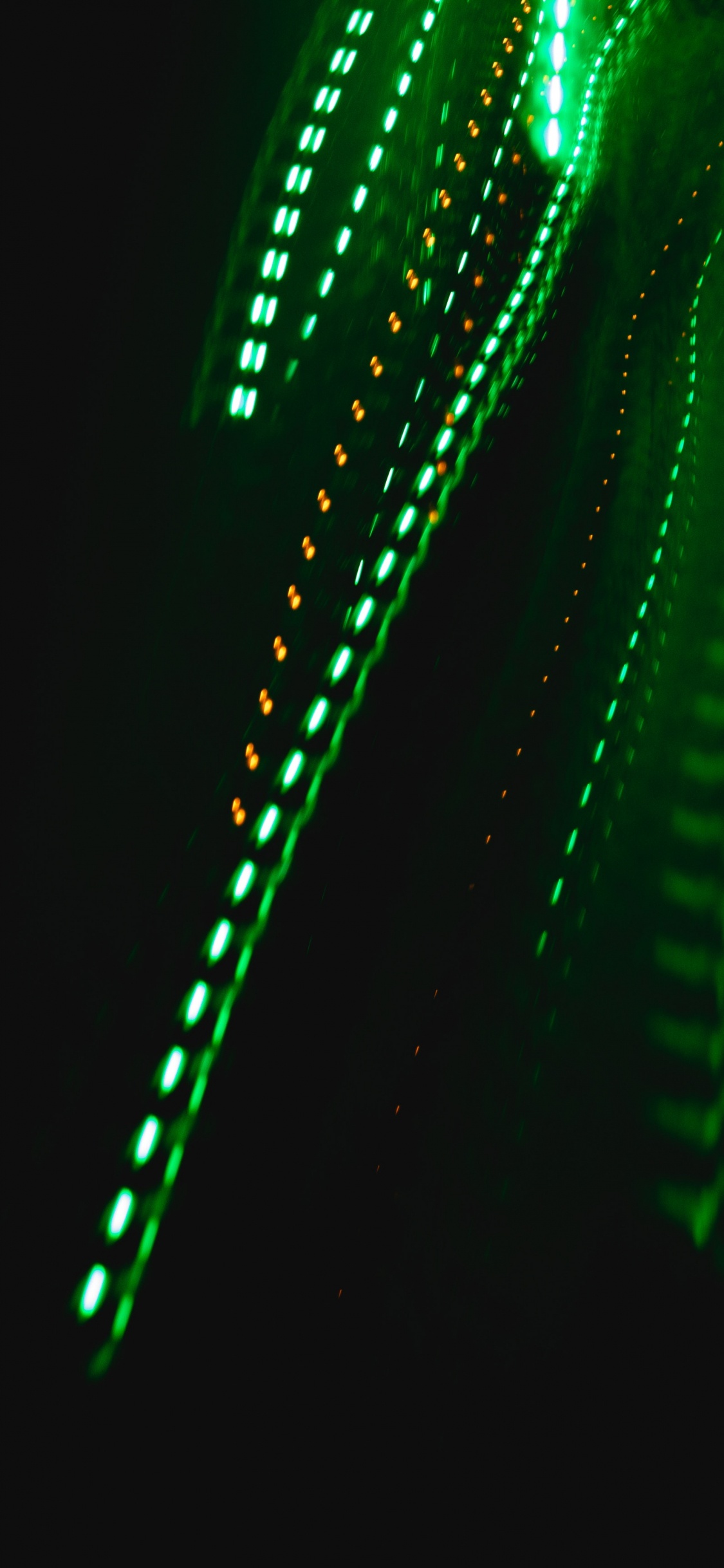 Green Light on Black Background. Wallpaper in 1125x2436 Resolution