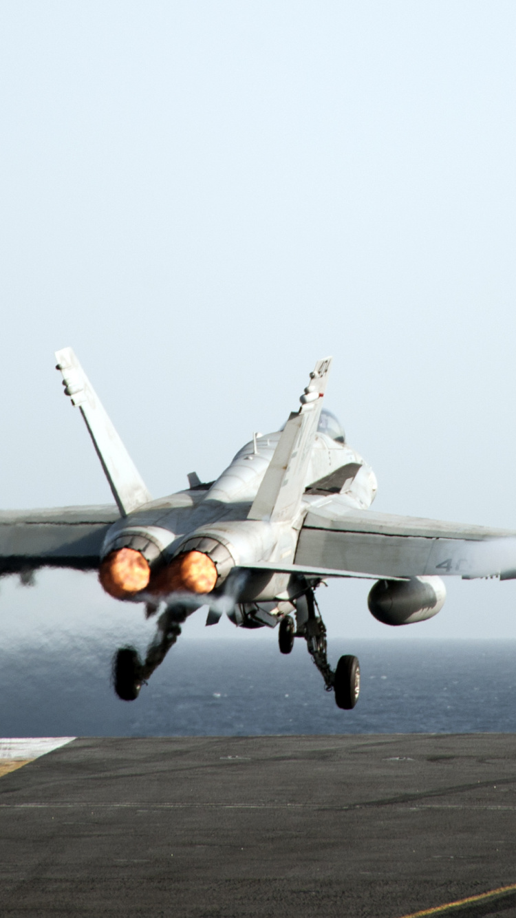 White Jet Plane on Gray Asphalt Road During Daytime. Wallpaper in 750x1334 Resolution