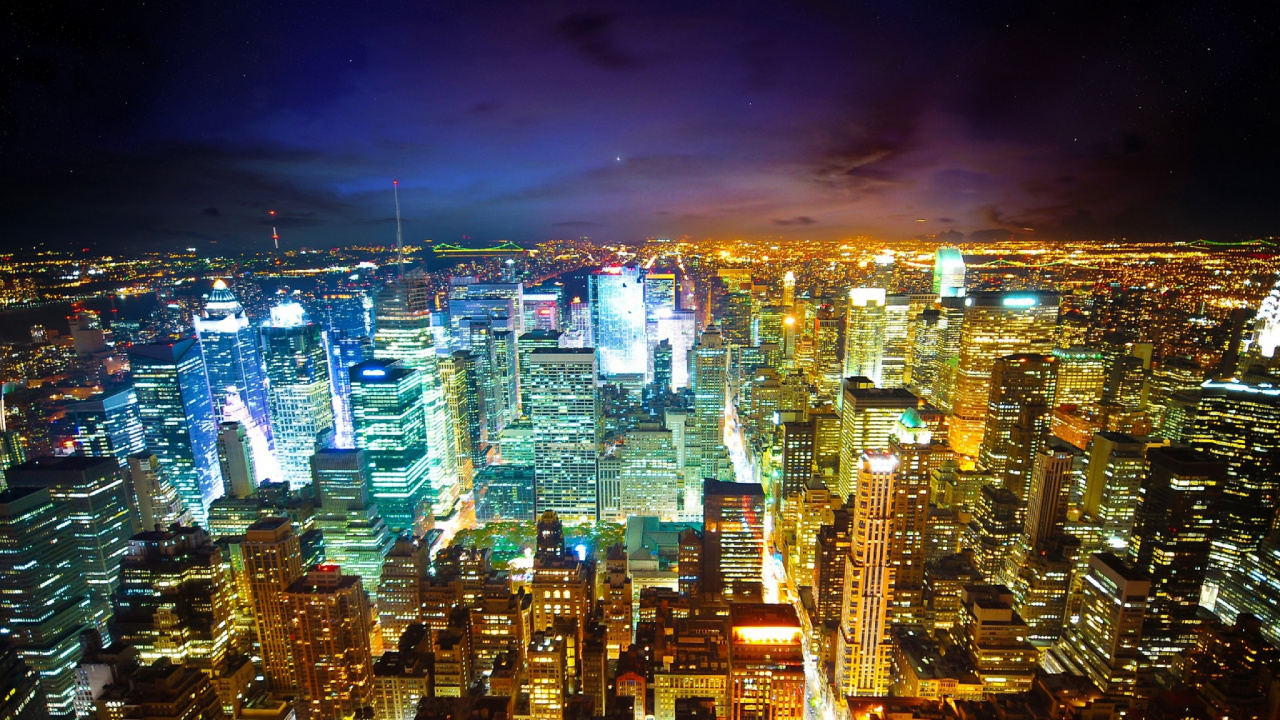 City With High Rise Buildings During Night Time. Wallpaper in 1280x720 Resolution