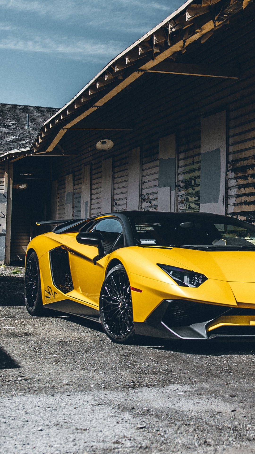 Yellow Lamborghini Aventador Parked Near Building During Daytime. Wallpaper in 1080x1920 Resolution