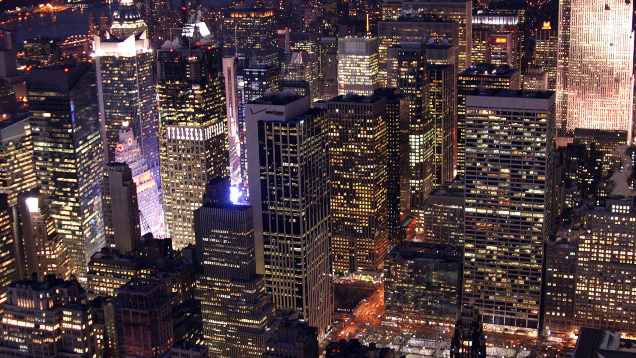 Aerial View of City Buildings During Night Time. Wallpaper in 1280x720 Resolution