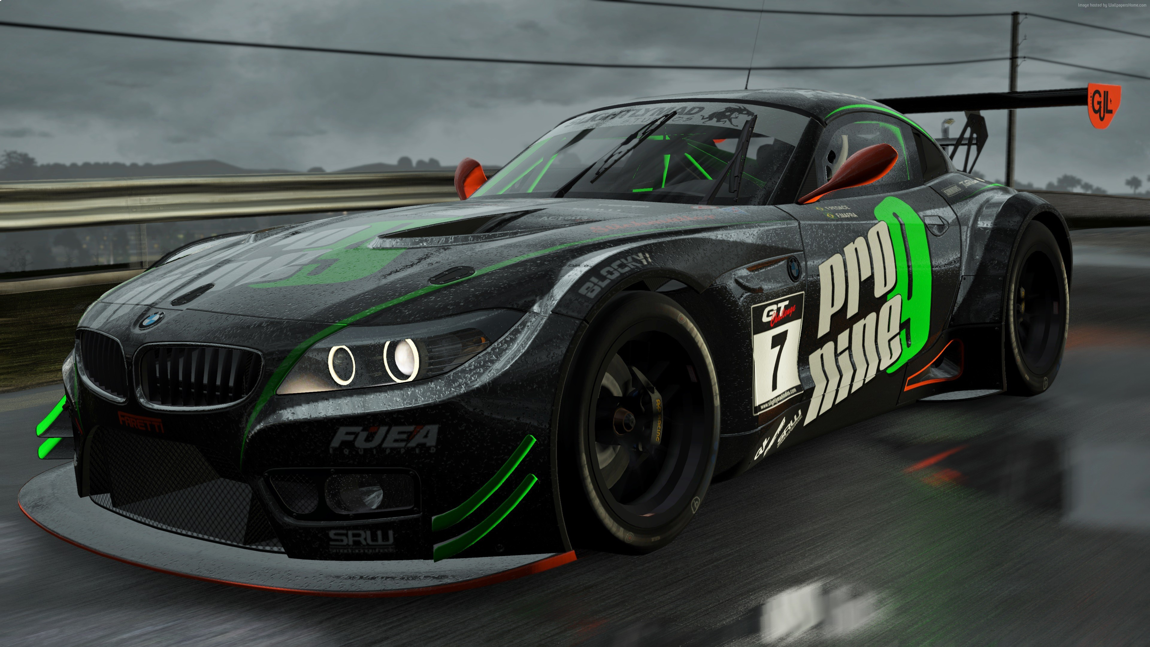 Green and Black Sports Car on Track Field. Wallpaper in 3840x2160 Resolution