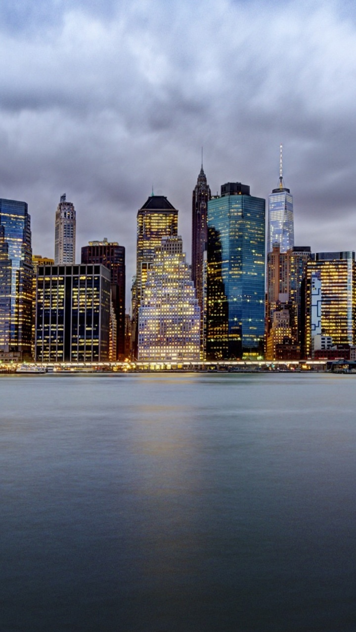 City Skyline Under Cloudy Sky During Daytime. Wallpaper in 720x1280 Resolution