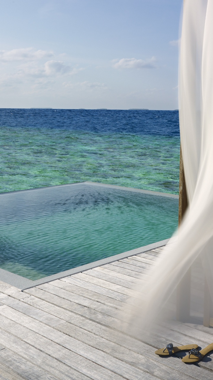 Barco Blanco y Azul en el Mar Durante el Día. Wallpaper in 720x1280 Resolution