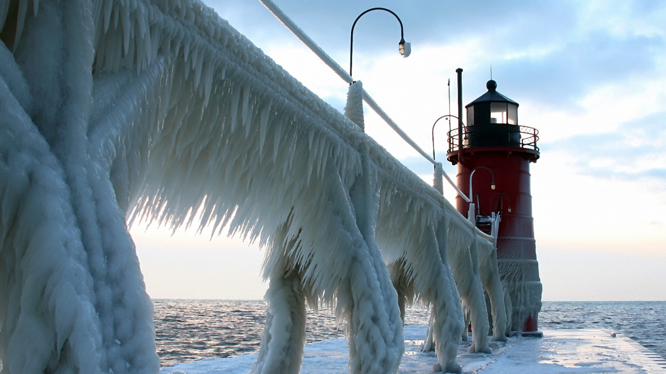 White and Red Lighthouse on White Snow Covered Ground During Daytime. Wallpaper in 1366x768 Resolution