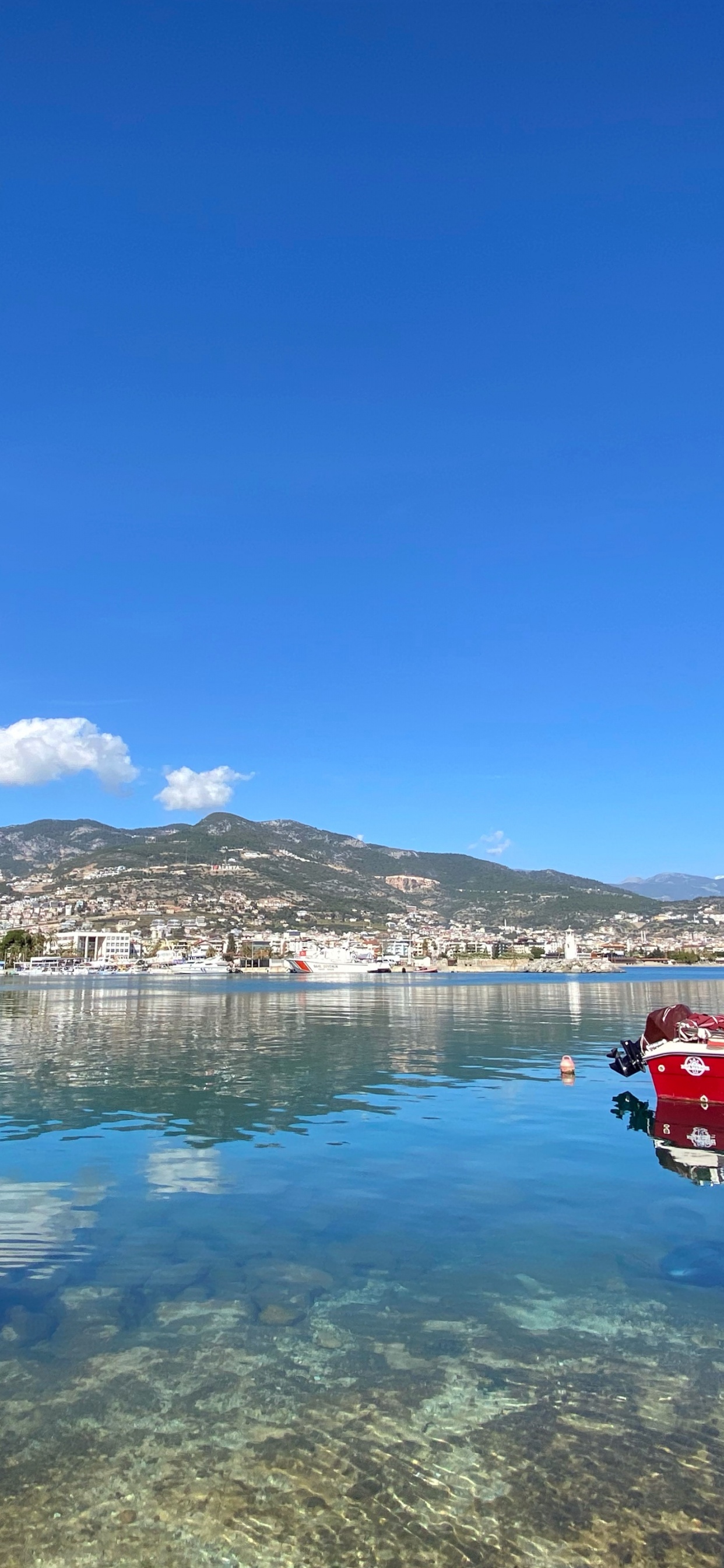 Water, Cloud, Mountain, Blue, Watercraft. Wallpaper in 1242x2688 Resolution