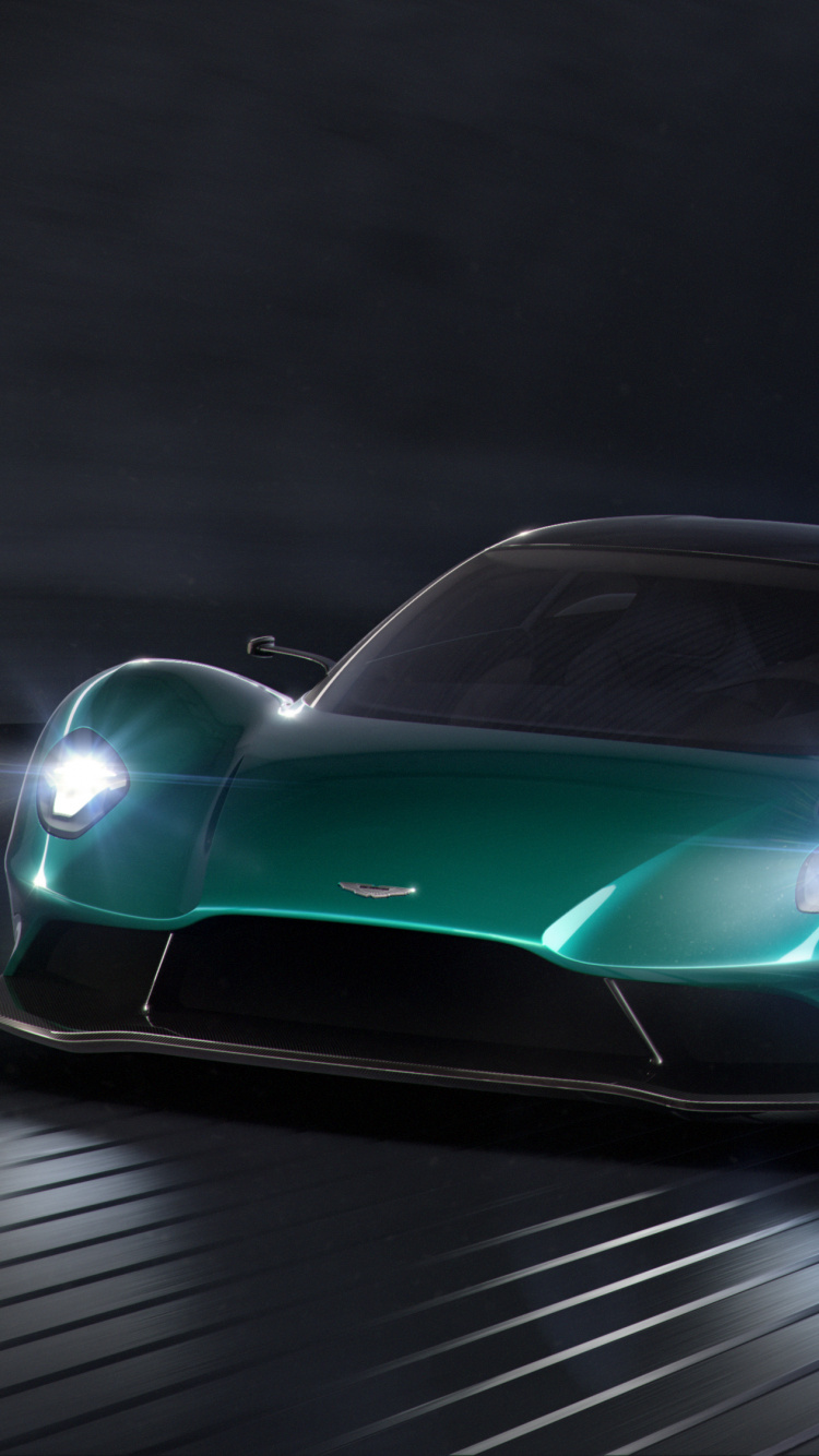 Voiture de Sport Ferrari Rouge Sur Une Route Grise. Wallpaper in 750x1334 Resolution