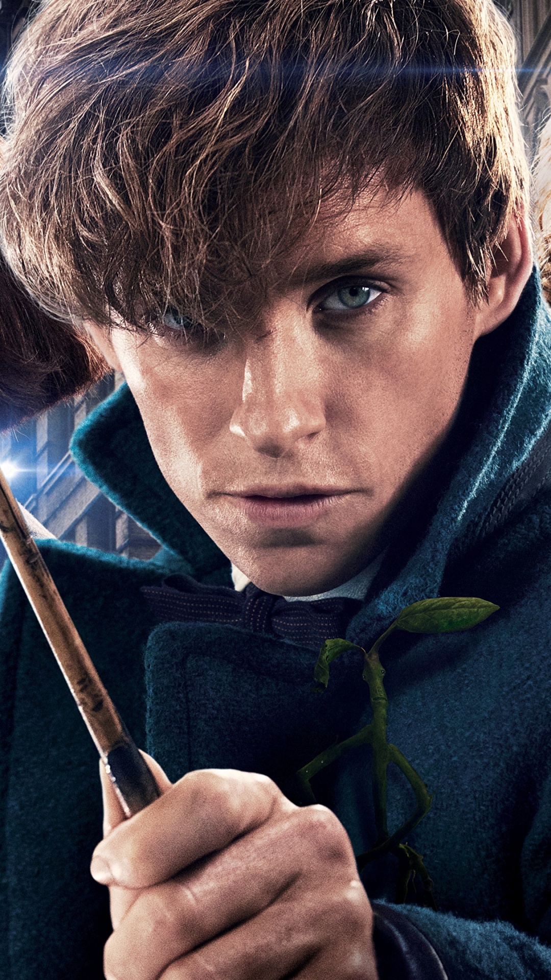 Man in Blue Hoodie Holding Black Stick. Wallpaper in 1080x1920 Resolution