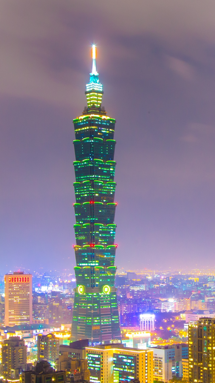 City Skyline During Night Time. Wallpaper in 720x1280 Resolution