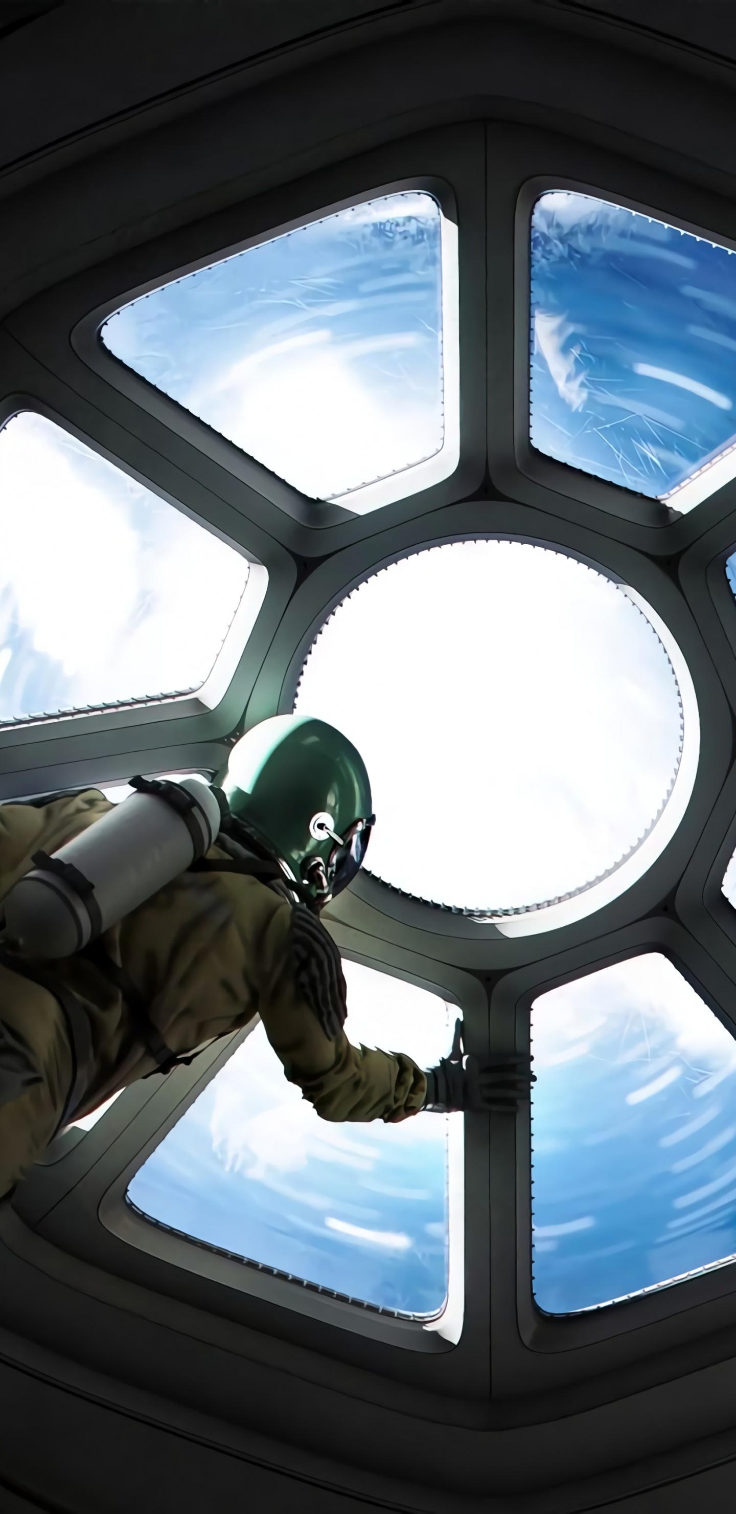 Mann in Brauner Und Schwarzer Jacke Und Hose im Flugzeug. Wallpaper in 1440x2960 Resolution