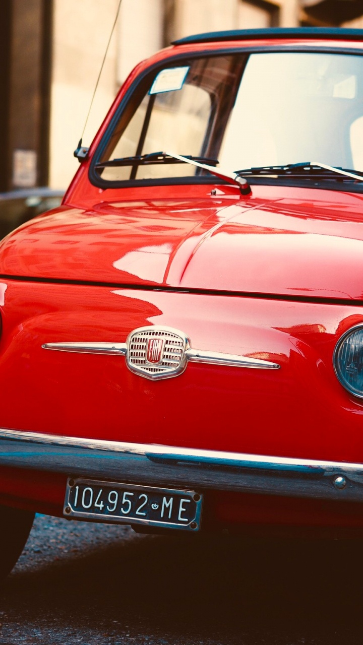 Red Volkswagen Beetle Parked on The Street During Daytime. Wallpaper in 720x1280 Resolution