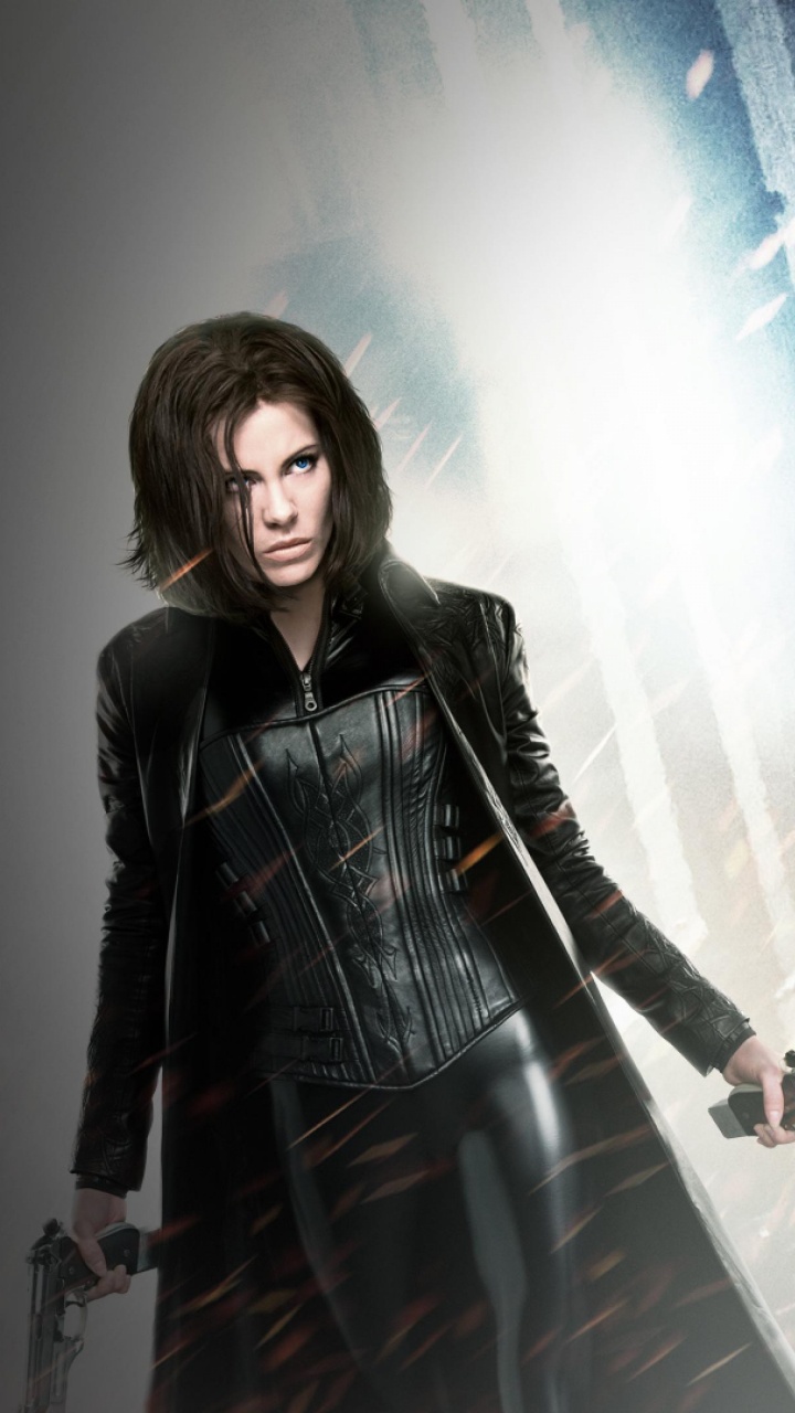 Woman in Black Leather Jacket Standing on Stage. Wallpaper in 720x1280 Resolution