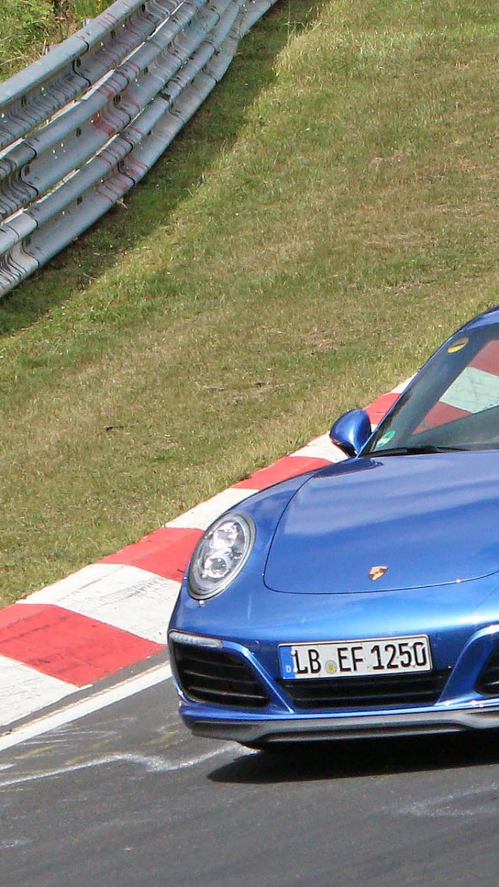 Blue Bmw m 3 Coupe Parked on Green Grass Field During Daytime. Wallpaper in 720x1280 Resolution