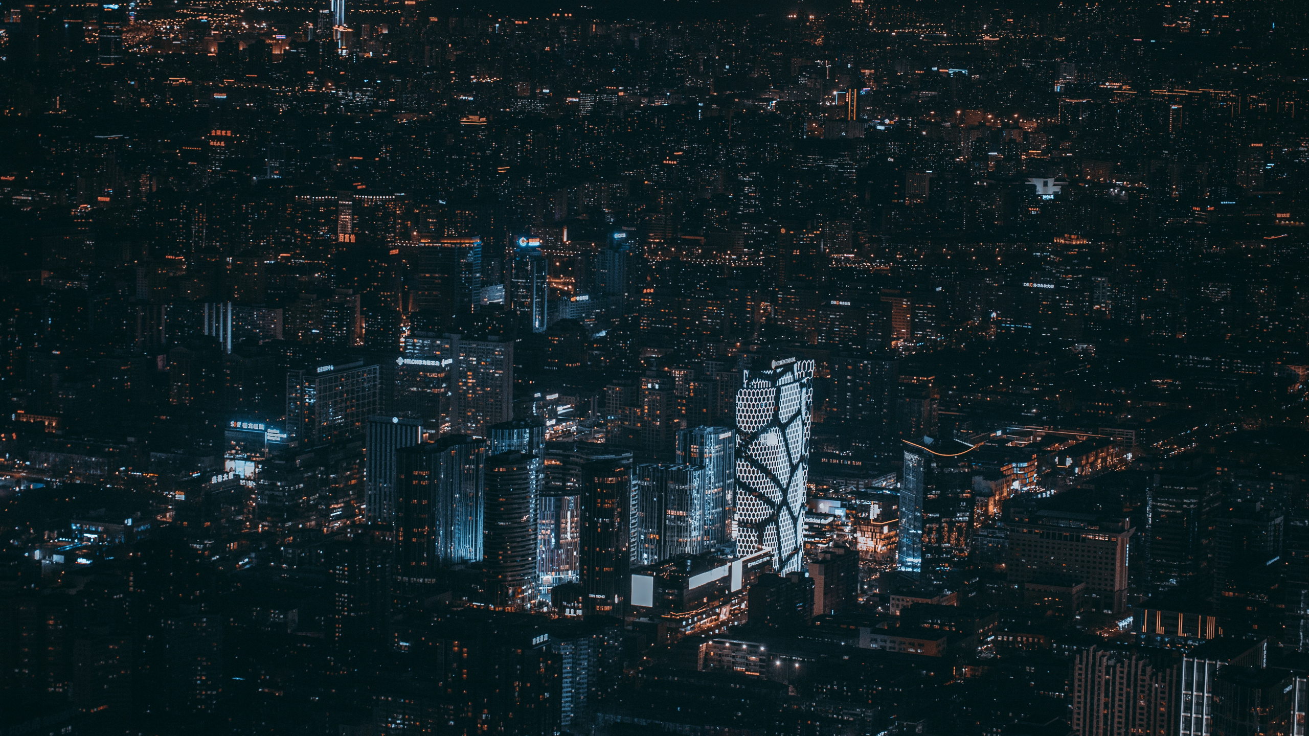 Aerial View of City Buildings During Night Time. Wallpaper in 2560x1440 Resolution