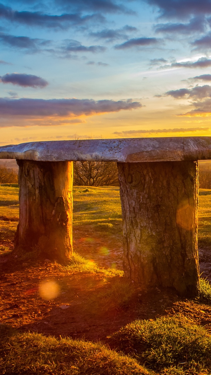 Brown Wooden Bench on Green Grass Field During Sunset. Wallpaper in 720x1280 Resolution