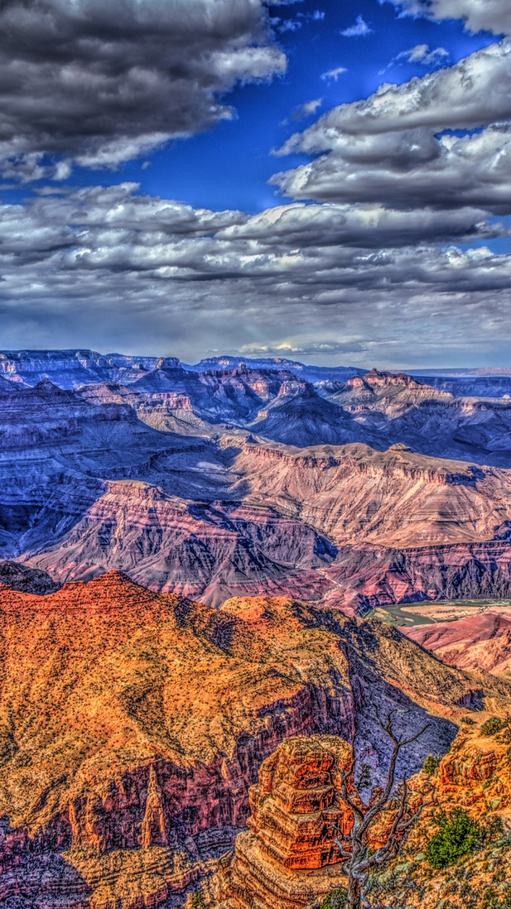 Brown and Green Mountains Under Blue Sky During Daytime. Wallpaper in 720x1280 Resolution