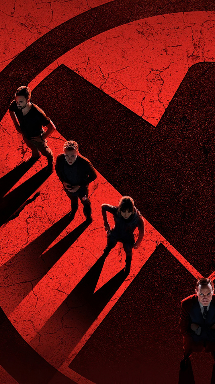 2 Men Standing on Red and Black Round Wall Art. Wallpaper in 750x1334 Resolution