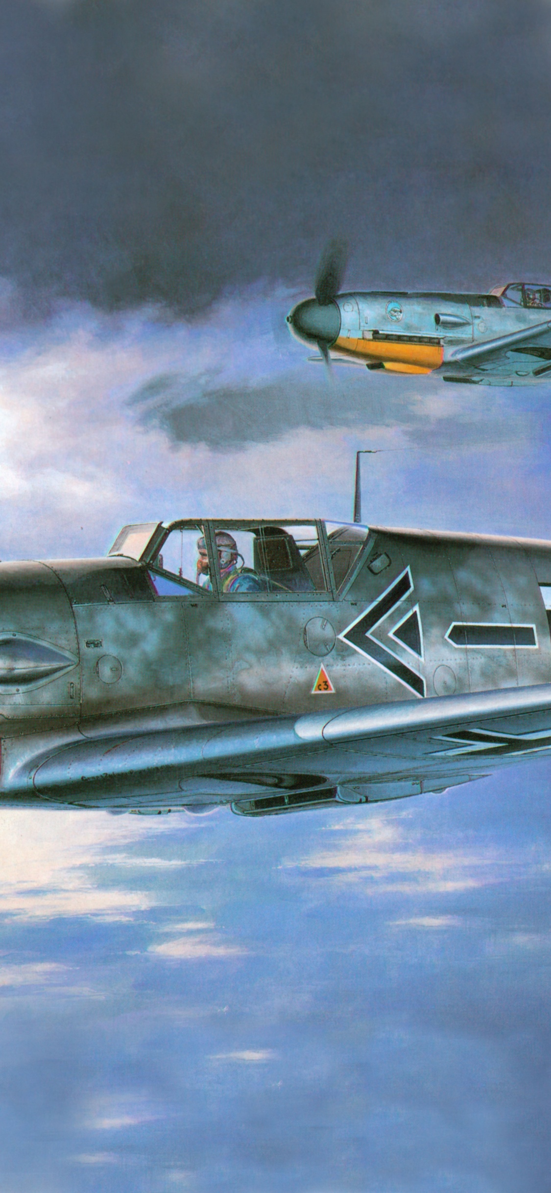 Avión de Combate Gris y Amarillo en el Cielo. Wallpaper in 1125x2436 Resolution
