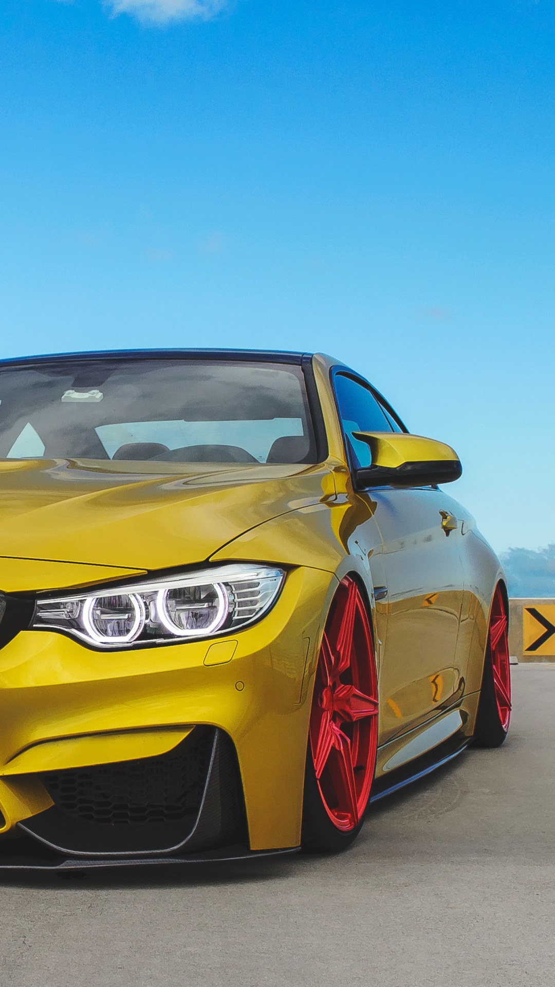 Yellow Bmw Car on Road During Daytime. Wallpaper in 1080x1920 Resolution