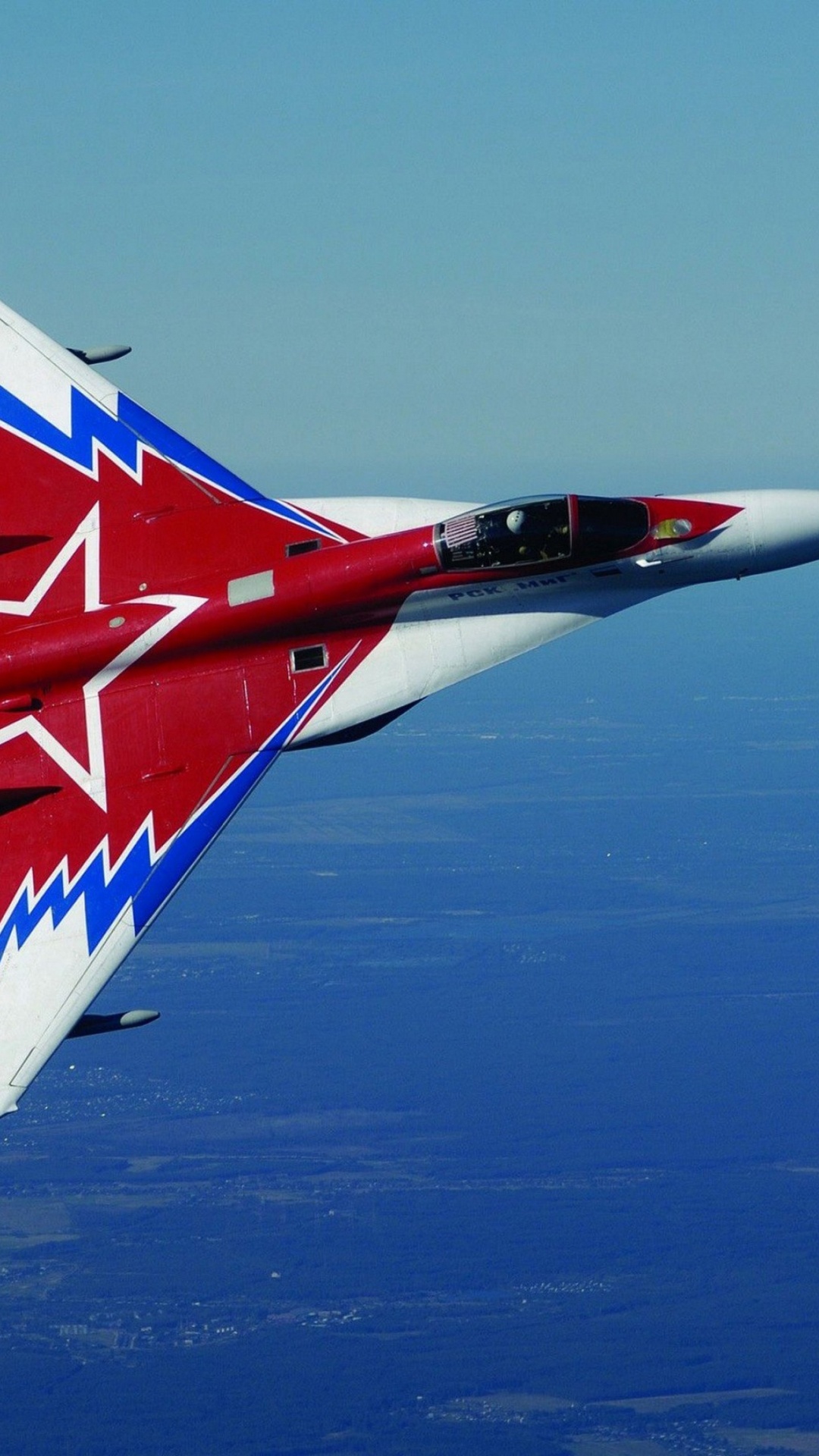 Red and White Jet Plane Flying Over Blue Sky During Daytime. Wallpaper in 1080x1920 Resolution