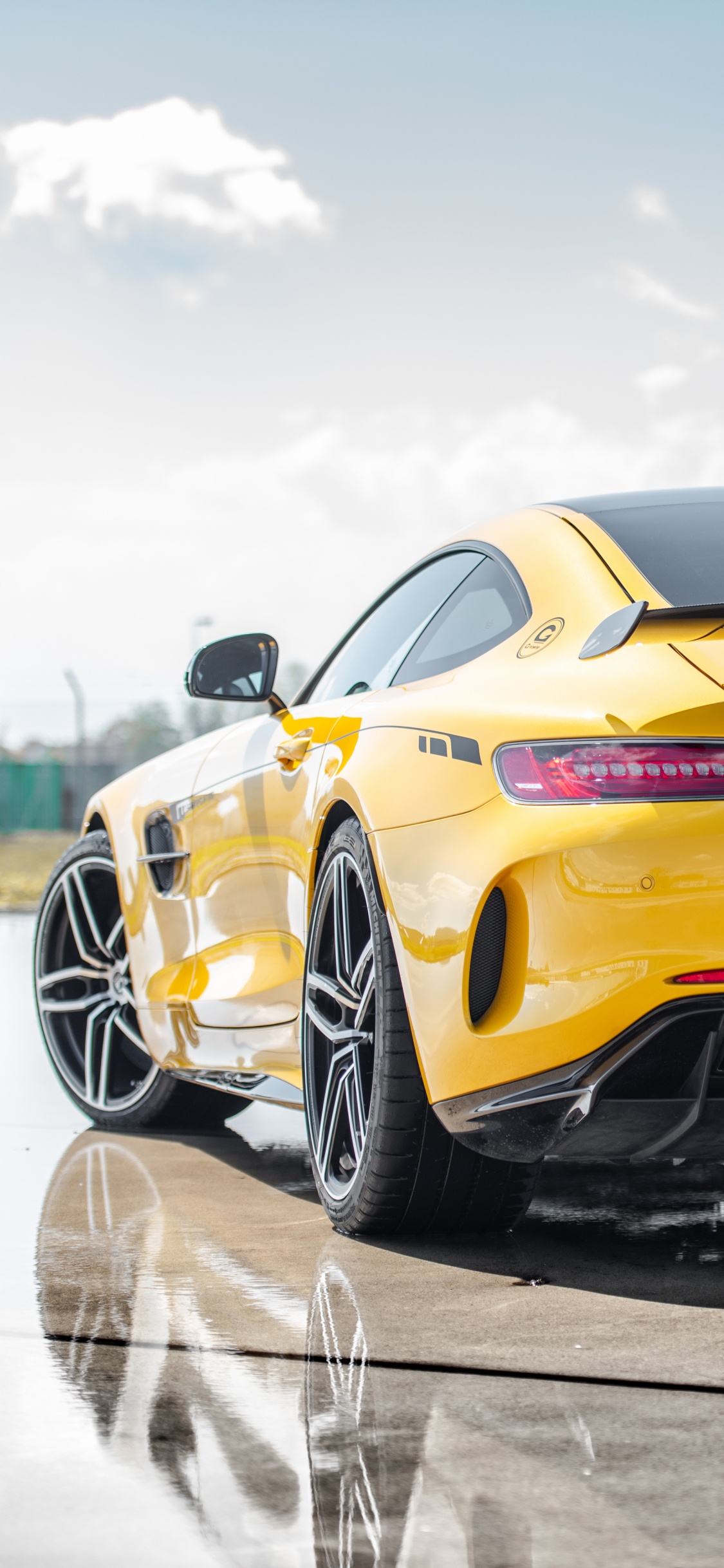 Yellow Chevrolet Camaro on Road During Daytime. Wallpaper in 1125x2436 Resolution