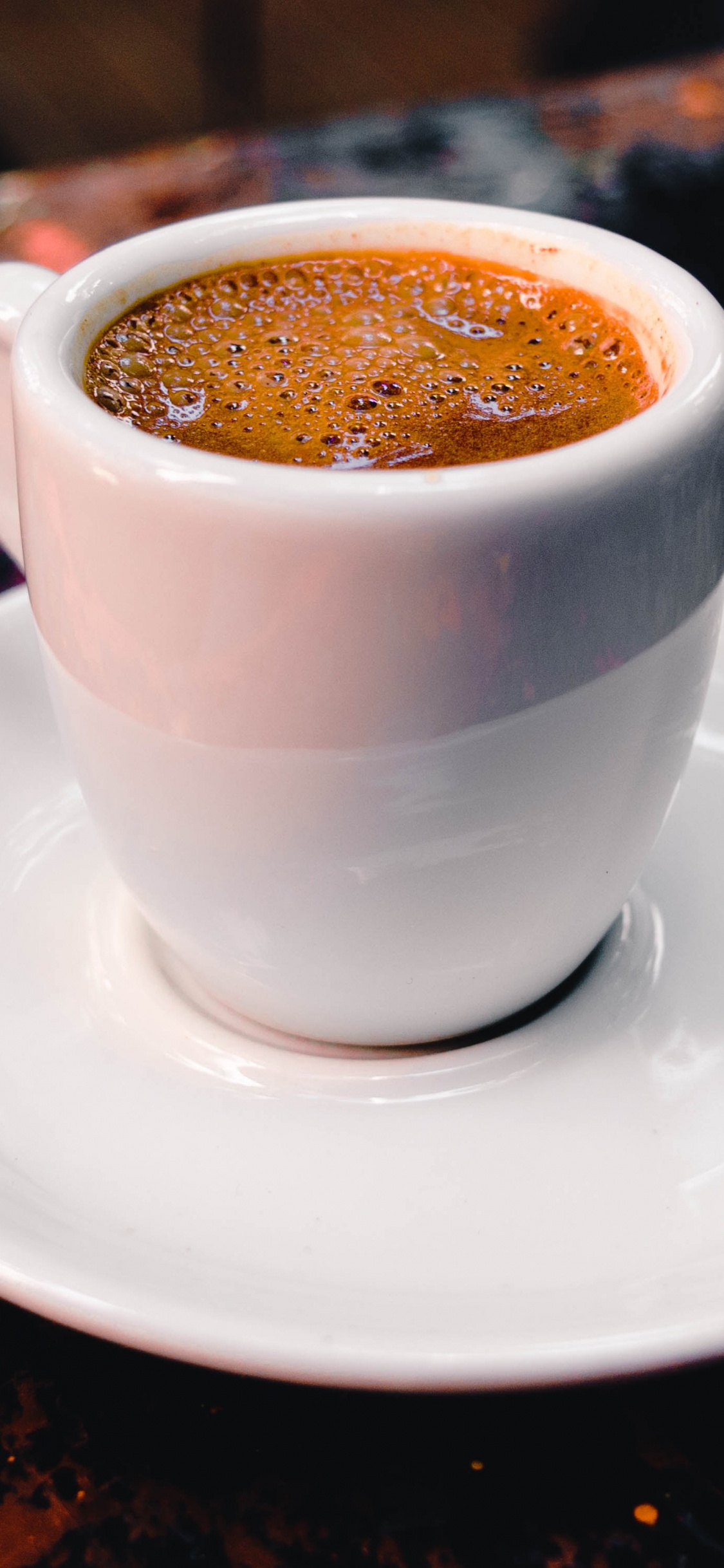 White Ceramic Cup on White Ceramic Saucer. Wallpaper in 1125x2436 Resolution