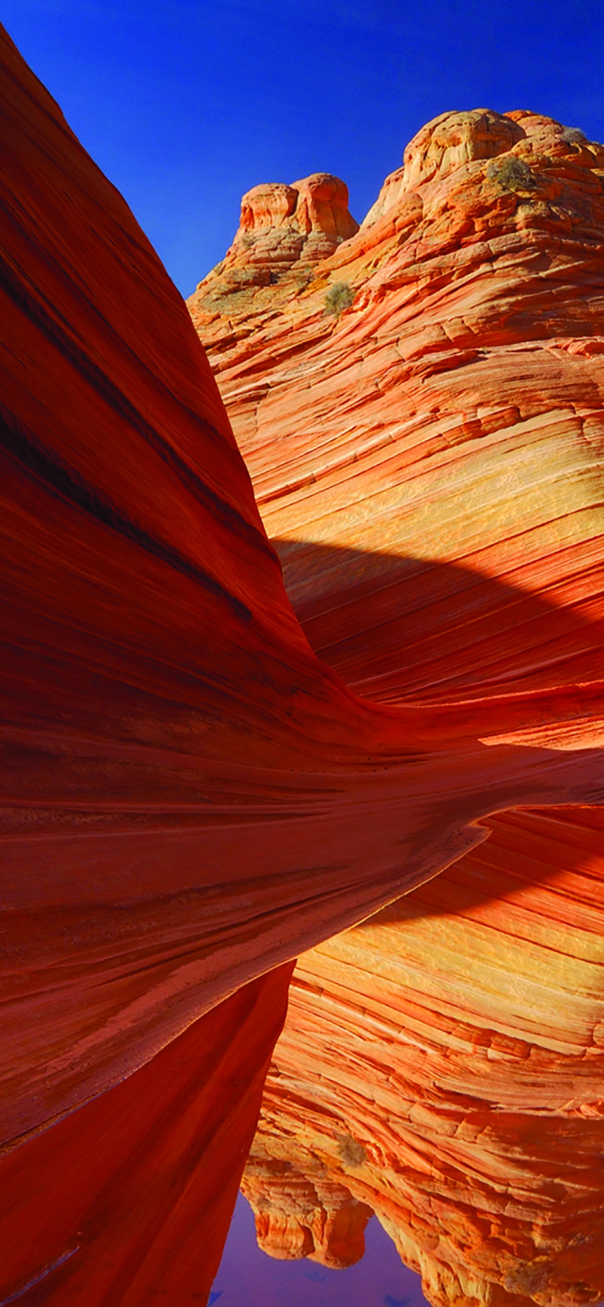 Brown Rock Formation Under Blue Sky During Daytime. Wallpaper in 1242x2688 Resolution