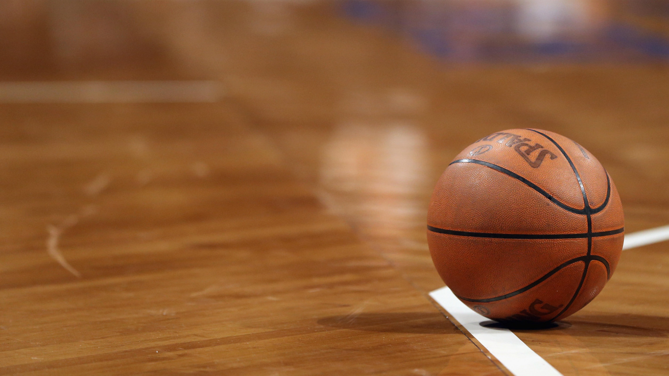 Brown Basketball on Brown Wooden Floor. Wallpaper in 1366x768 Resolution